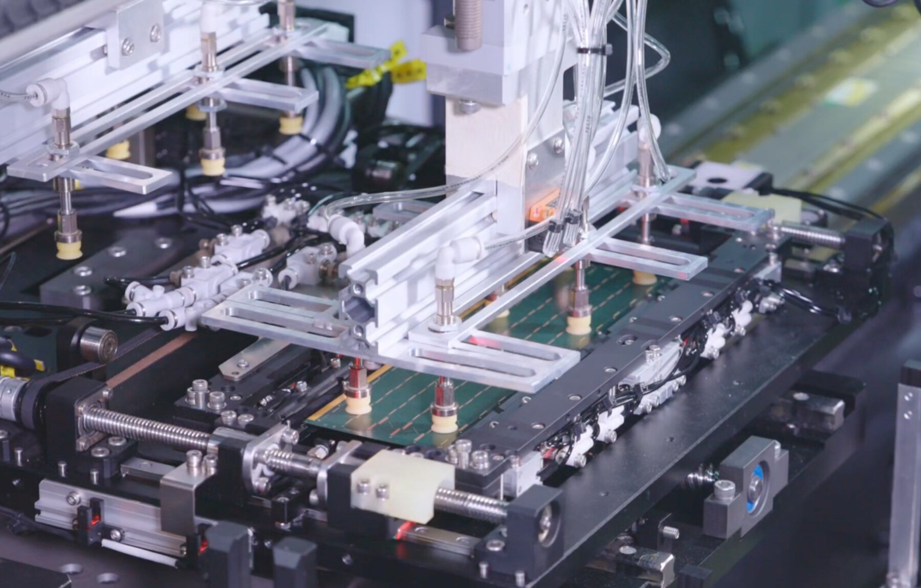 Axis-Tec IC substrate tester stage with automatic fixture positioning and contact hardware